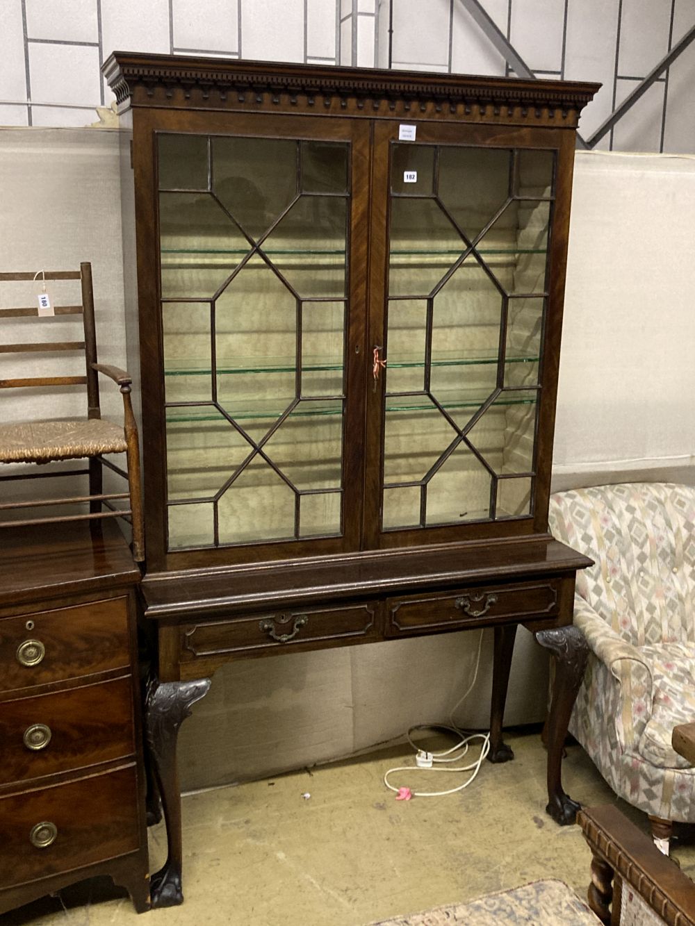 A Chippendale revival mahogany display cabinet on stand, width 114cm depth 43cm height 192cm